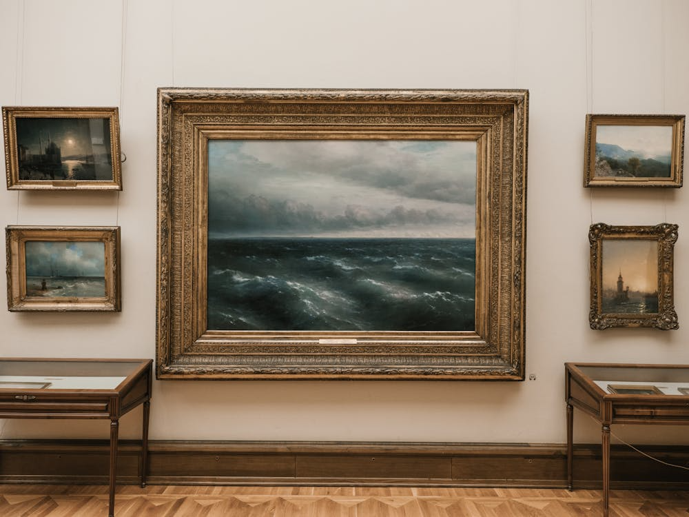 Fine art paintings displayed in a private gallery