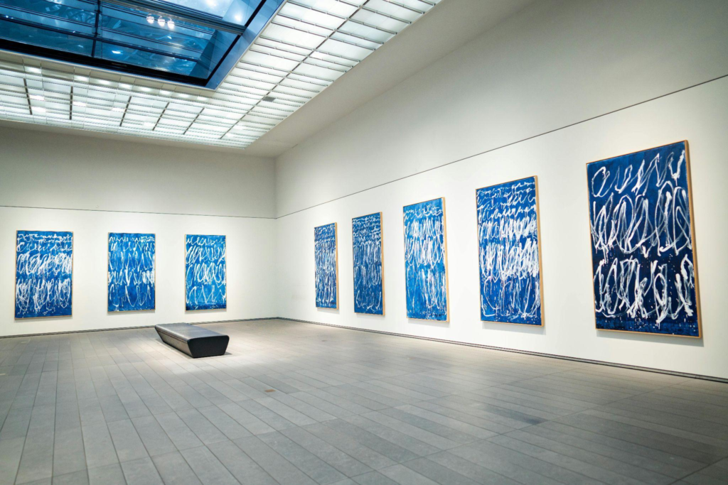 a collection of art frames on display